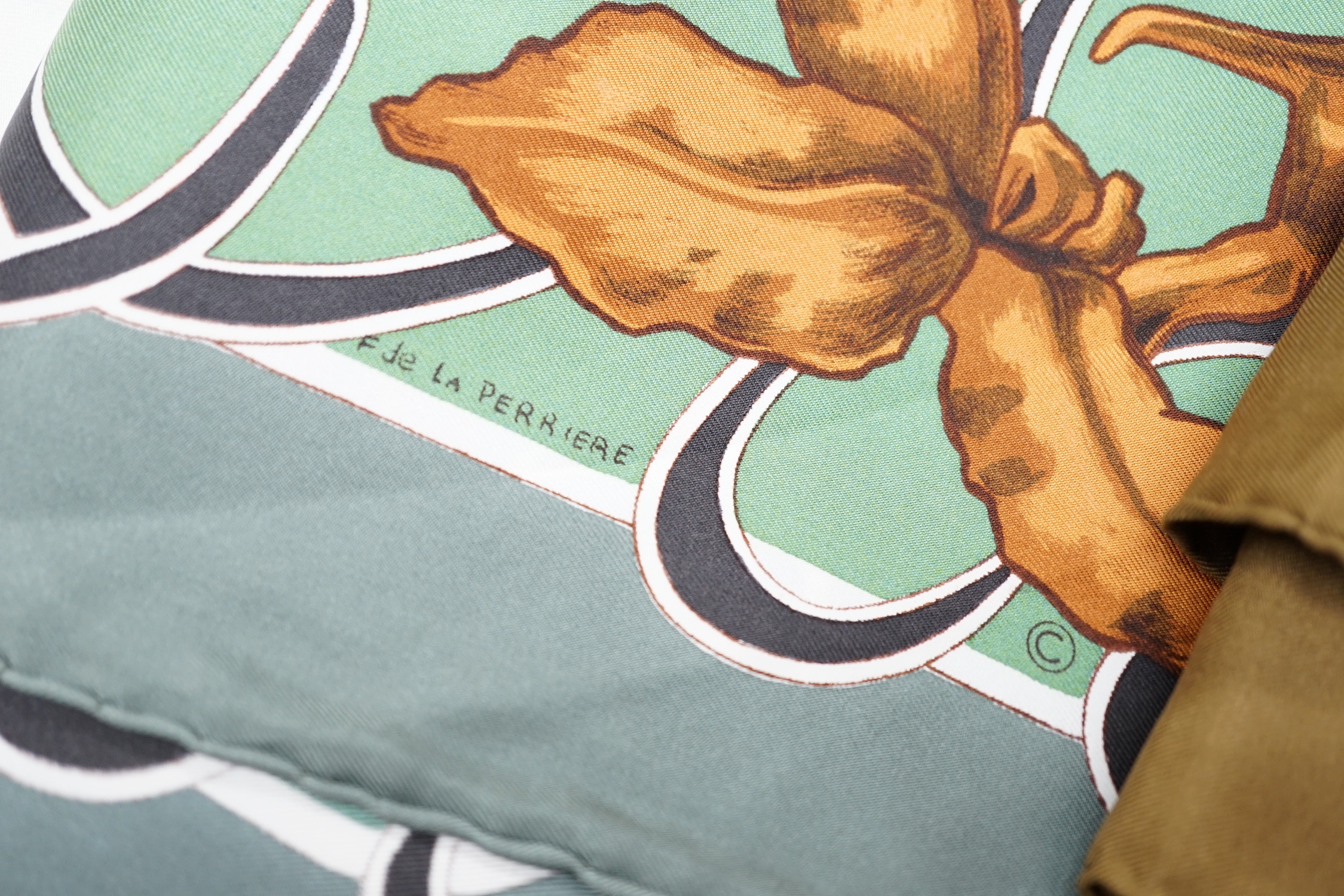 Four vintage Hermes silk scarves comprising Ingrid, Belle Epoque, Passementerie and a rectangular Cheval Turc example retailed by Harrods with label